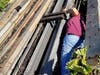 Three puppies were rescued after wedging themselves under some metal beams at a Tampa recycling company and getting stuck. 