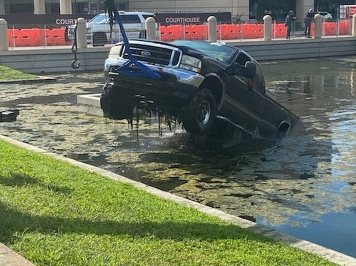 Pickup Truck Crashes Into Retention Pond Near Pinellas Courthouse
