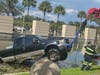 The driver of a pickup truck escaped injury Wednesday afternoon after crashing into a retention pond outside the Pinellas County Courthouse.