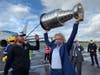 Mayor Jane Castor wields the Stanley Cup. 