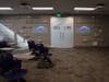 A 1000-square-foot open training room is equipped with a motorized projector screen, and an in-ceiling projector with adaptive wireless connectivity to four ceiling-mounted monitors.