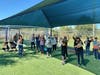 Healthy and playful, about 20 of the former "Diana Street dogs" frolicked outside the Pet Resource Center at a Nov. 17 reunion.