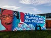 The mural, located on the Northern end of the property facing the Pearl Apartments complex, showcases the Glazer Vision Foundation’s mission of providing “Glasses For All Children."