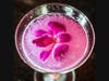 This drink includes gin, organic lavender, lime juice and simple syrup.