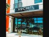 The 2,500-square-foot Xochitl is the first location and occupies the street-level retail space beneath the Pearl Apartments.