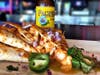 Have some mouth-watering shrimp quesadillas.