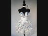 The agency commissioned artists to bring vacant storefronts in downtown Clearwater to life with wearable art exhibits.