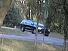 Surveillance cameras caught a photo of a black Dodge Durango leaving the crime scene.