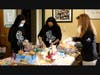 Maria Sanchez, Liz Castro, and Karen Garcia makes sandwiches at Saint Leo University on Monday for PB&J for Tampa Bay.