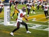 Bucs tight end Cameron Brate celebrates a touchdown pass from quarterback Tom Brady after a turnover against the Green Bay Packers in the NFC Championship Game.