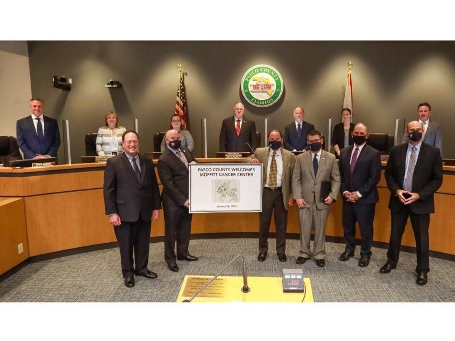 The Pasco County Commission, the Pasco Economic Development Council and Moffitt Cancer Center officials celebrate finalizing the agreement for Moffitt to build a new campus on 775 acres in Pasco County. 