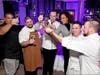 ESPN's Sage Steele and participating chefs toast the event.