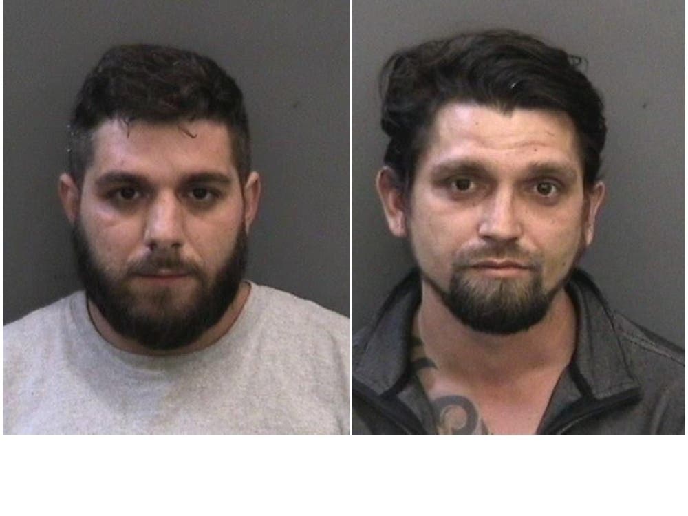 Police arrested 29-year-old Denis Redzic, left, and 33-year-old Zijad Nuhanovic.