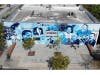 On the mural, from left, are Rick Casares, Clara Frye, George Edgecomb, Robert W. Saunders Sr., Lou Piniella, Mr. and Mrs. Salcines, Carl “Red” Guggino (boxer), E.J. Salcines, Alton White, Leon Claxton, Jetie B Wilds Jr. and Blas O’Halloran. 
