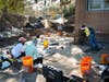 University of South Florida students work on the excavation of the North Greenwood Cemetery.