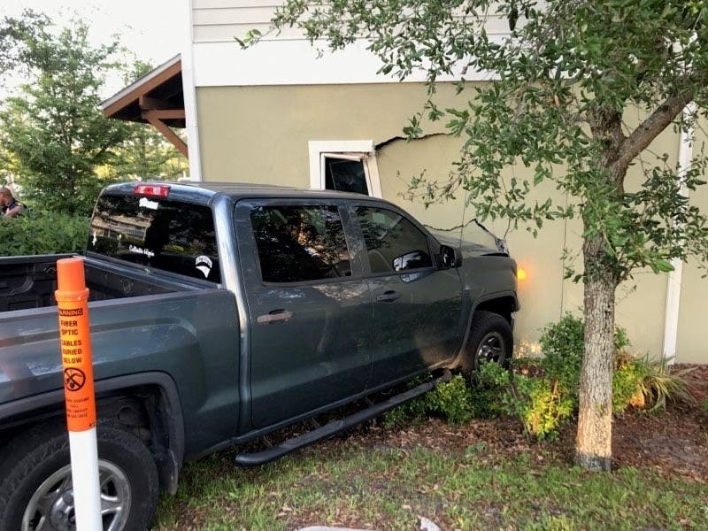 A 15-year-old boy was arrested after stealing a pickup truck and crashing into a Clearwater home.