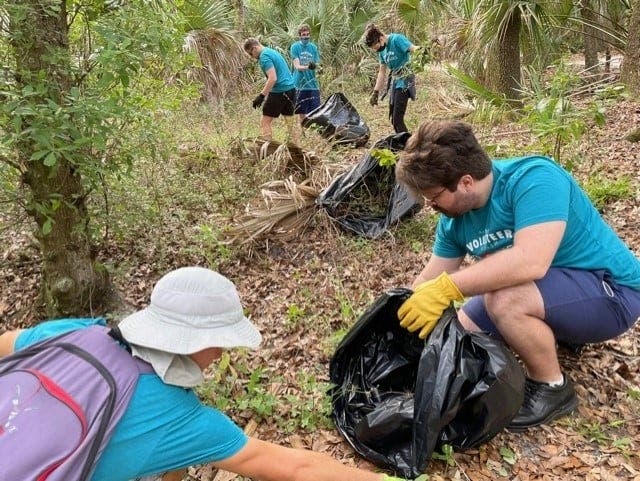 Volunteers from the Lake Belleview Neighborhood Association, the Clearwater Police Department, Clearwater Parks & Recreation Department, Clearwater Code Enforcement and the Clearwater Marine Aquarium help clean up the Lake Belleview area April 10.