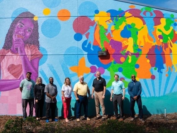 Clearwater city officials celebrate the completion of the mural. 