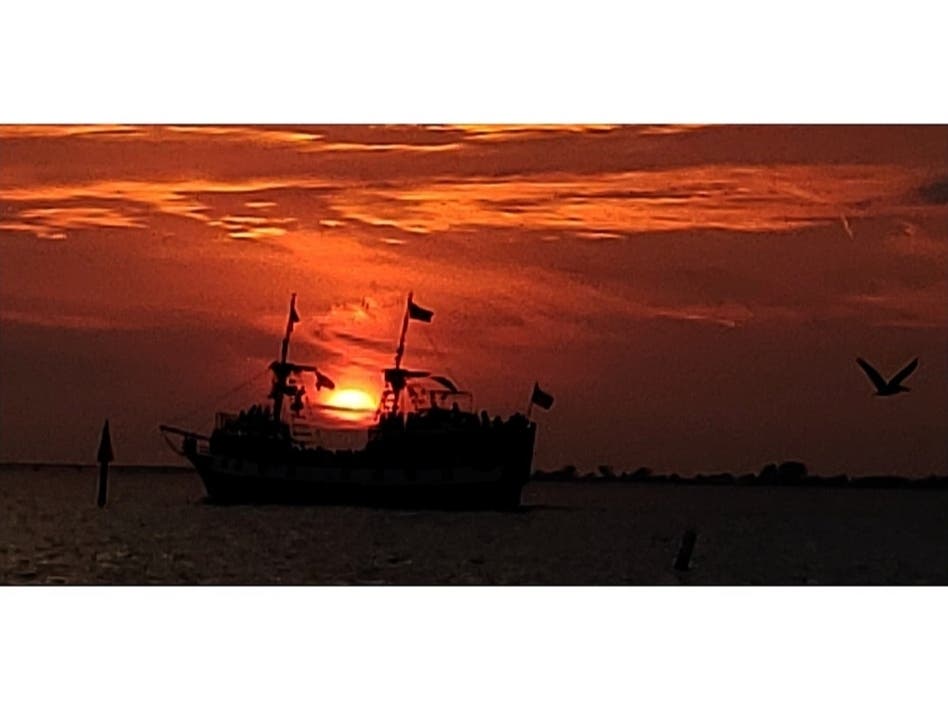 This scene taken at sunset at Bowditch Point Park in Lee County by Shannon Wells probably resembles a view of a tall ship residents might have spotted from Fort Myers in the 18th century. 