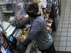 Tampa police are asking for the public's help to identify two people who robbed a Mobil service station at gunpoint Sunday night. 