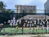 Loved ones have posted photos and placed flowers along a makeshift memorial at the disaster site. 