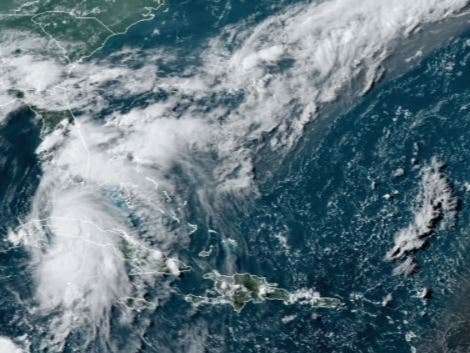 A satellite image from the National Oceanic and Atmospheric Administration shows Tropical Storm Elsa heading toward Florida's west coast. 