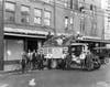 Proving that nothing can stop the presses, drivers prepare to delivery the Tampa Tribune following the 1921 hurricane. 