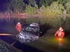 Hillsborough County Sheriff's Office underwater recovery team had their hands full Saturday night when a driver skidded on a slick roadway following a downpour and the car nose-dived into a retention pond off Lutz-Lake Fern Road in the Cheval subdivision.