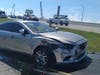 The hit-and-run driver was driving a Mazda 6. 