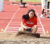 Dani Kanas, 16, competes in track and field.