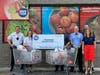 The grand reopening included a donation to Feeding Tampa Bay. From left are Cpl. Ryan Thomas, Catherine Godwin of Feeding Tampa Bay, Officer Travis Robins and Michael Needler and Julie Anderson.