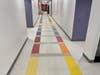 The new school features bright, colorful hallways.