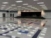 The large cafeteria at the new school features a stage. 