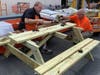 Team Depot at the Crystal River Home Depot builds a picnic table.
