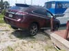 Police were notified that a car was precariously perched with the back end on the pavement and the front end hanging over the water. 