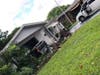 A resident escaped with only minor injuries when a 30-year-old Port Richey woman driving a GMC pickup truck collided with the front of a home at 7331 Oak Crest Drive. 