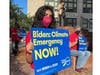 Climate activists rally outside Tampa City Hall.