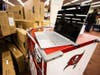 The Tampa Bay Buccaneers foundation presents Young Middle School faculty with a technology donation as part of the Verizon Digital Divide program. 