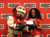The Tampa Bay Buccaneers foundation presents Young Middle School faculty with a technology donation as part of the Verizon Digital Divide program. 