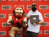 The Tampa Bay Buccaneers foundation presents Young Middle School faculty with a technology donation as part of the Verizon Digital Divide program. 