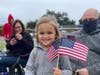 Families lined up to watch the annual Town n' Country Veterans Day parade Saturday. 