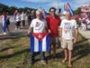Tampa City Councilman Luis Viera, center, the son of Cuban refugees, joins protesters along Dale Mabry Highway Sunday. 