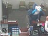 Before making off with an undisclosed amount of money, he told the clerk he was sorry, adding, "God bless," then he fled.
