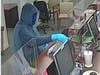 Before making off with an undisclosed amount of money, he told the clerk he was sorry, adding, "God bless," then he fled.
