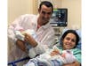 Dolly Lopez and her husband Romilio Torres hold the Lopez-Torres twins, a boy and a girl, who also were delivered on Feb. 22, 2022. 
