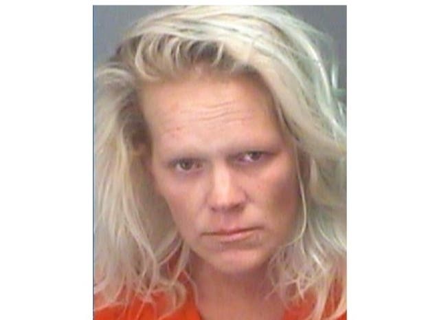 Audra Nelson, 39, was charged with driving under the influence, child neglect and possession of alprazolam and methamphetamine.


