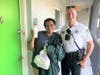 The good-natured customer posed for a photo with the deputy who finished delivering the DoorDash meal order. 