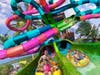 Rapids Racer is Adventure Island's all-new water slide featuring the world's first dueling saucers. Riders grab a two-person raft before racing through nearly 600 feet of slide.