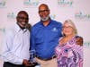 Earl Gloster, director of Clearwater Solid Waste & Recycling, and Clearwater Recreation Supervisor Samantha Moullet accept honors for Clearwater's beautification and recycling efforts. 