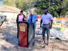 Tampa Mayor Jane Castor, with city council chairman Orlando Gudes, left, and home builder Darak Fullwood, announce the city's second infill project to provide affordable housing. 